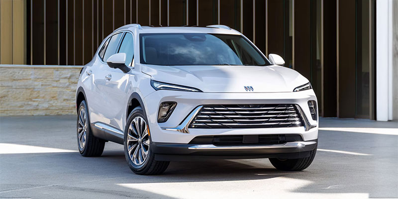 A 2025 Buick Envision parked outside a home in Akron, OH