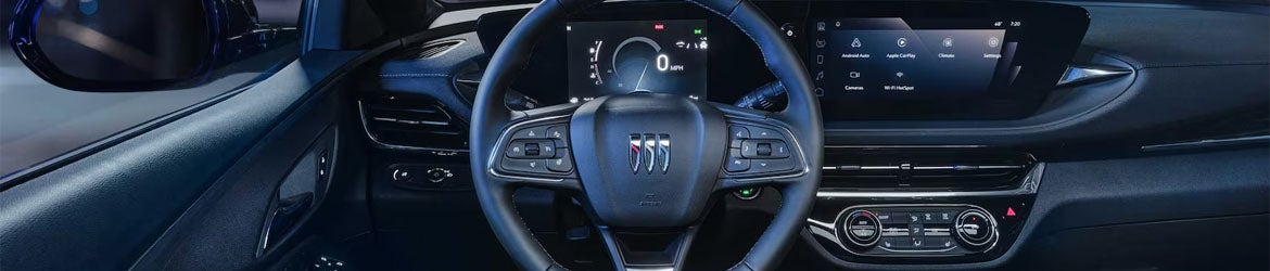 2026 Buick Envista steering wheel and driver controls with modern interior technology in Akron, OH